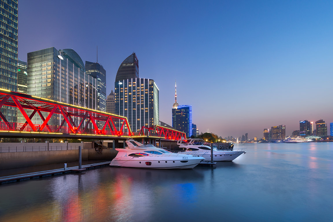 Red bridge at a marina on the Shanghai Huangpu River