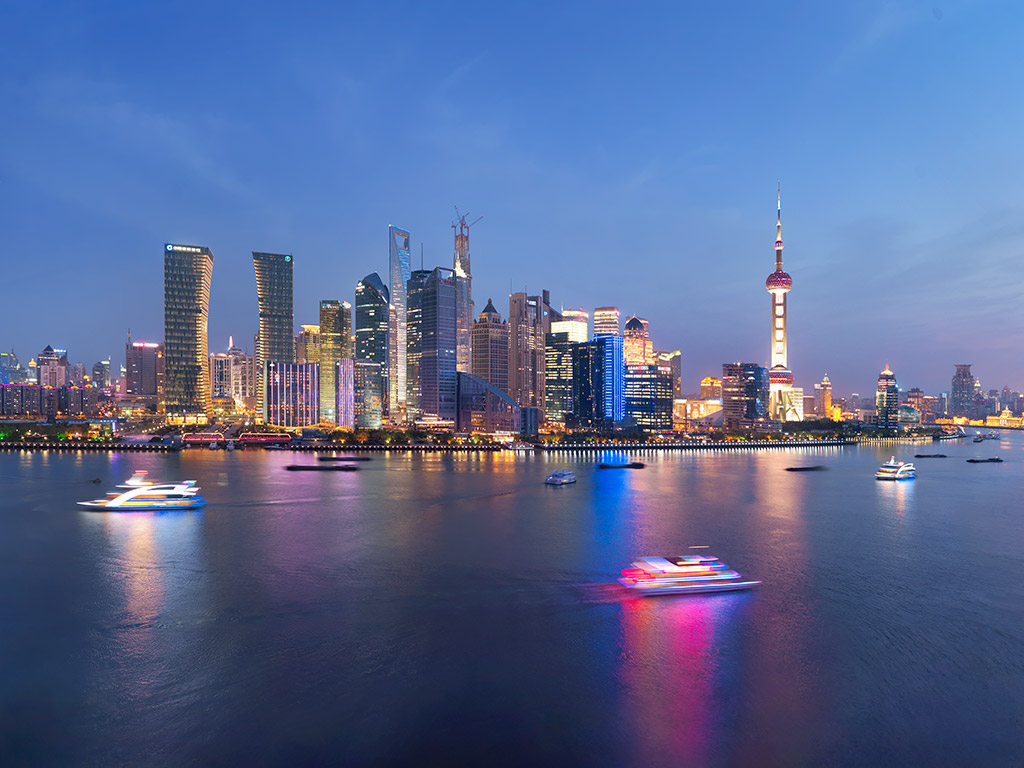 Views of the Mandarin Oriental Hotel across the Shanghai Huangpu River and to The Bund.