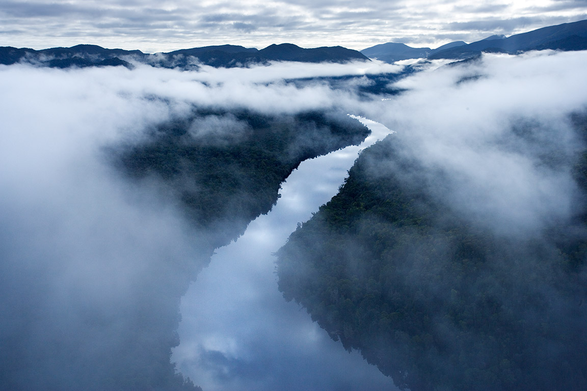 Morning mist over the  Gordon River in the Tasmanian wilderness, Australia